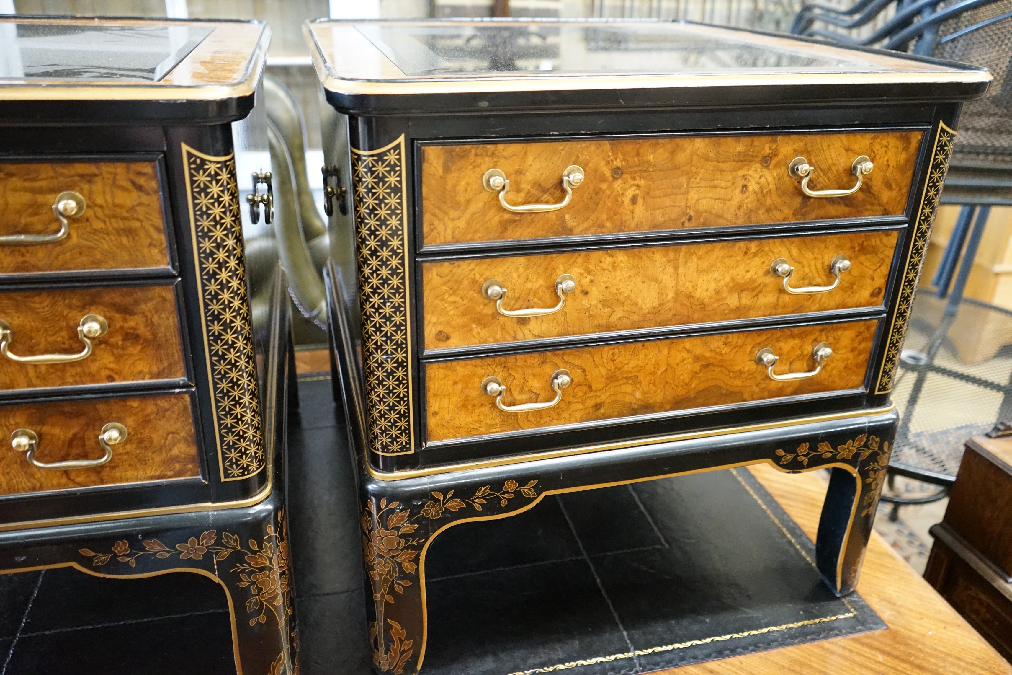 A pair of Drexel chinoiserie decorated, ebonised and pollard oak three drawer tables with glass tops, length 60cm, depth 66cm, height 62cm